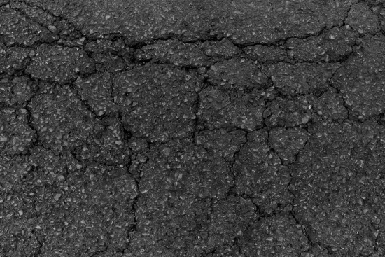 common causes of asphalt driveway damage and how to prevent them